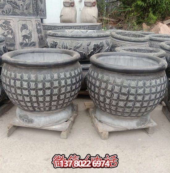 自然美學(xué)結(jié)合青石石雕、浮雕、編織、雕塑的戶外園林魚缸