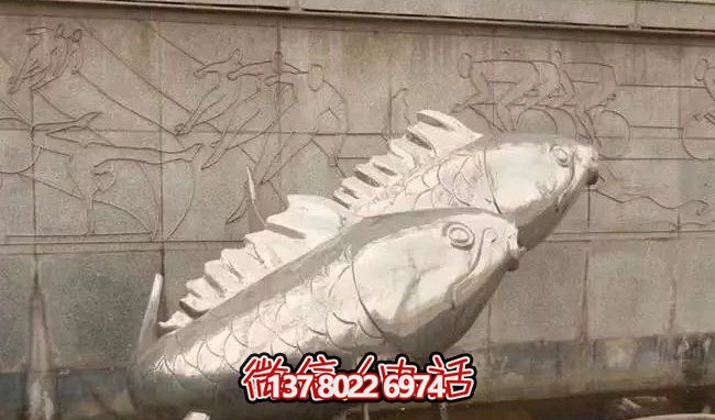 庭院里擺放的雙魚(yú)玻璃鋼創(chuàng)意乒乓球雕塑